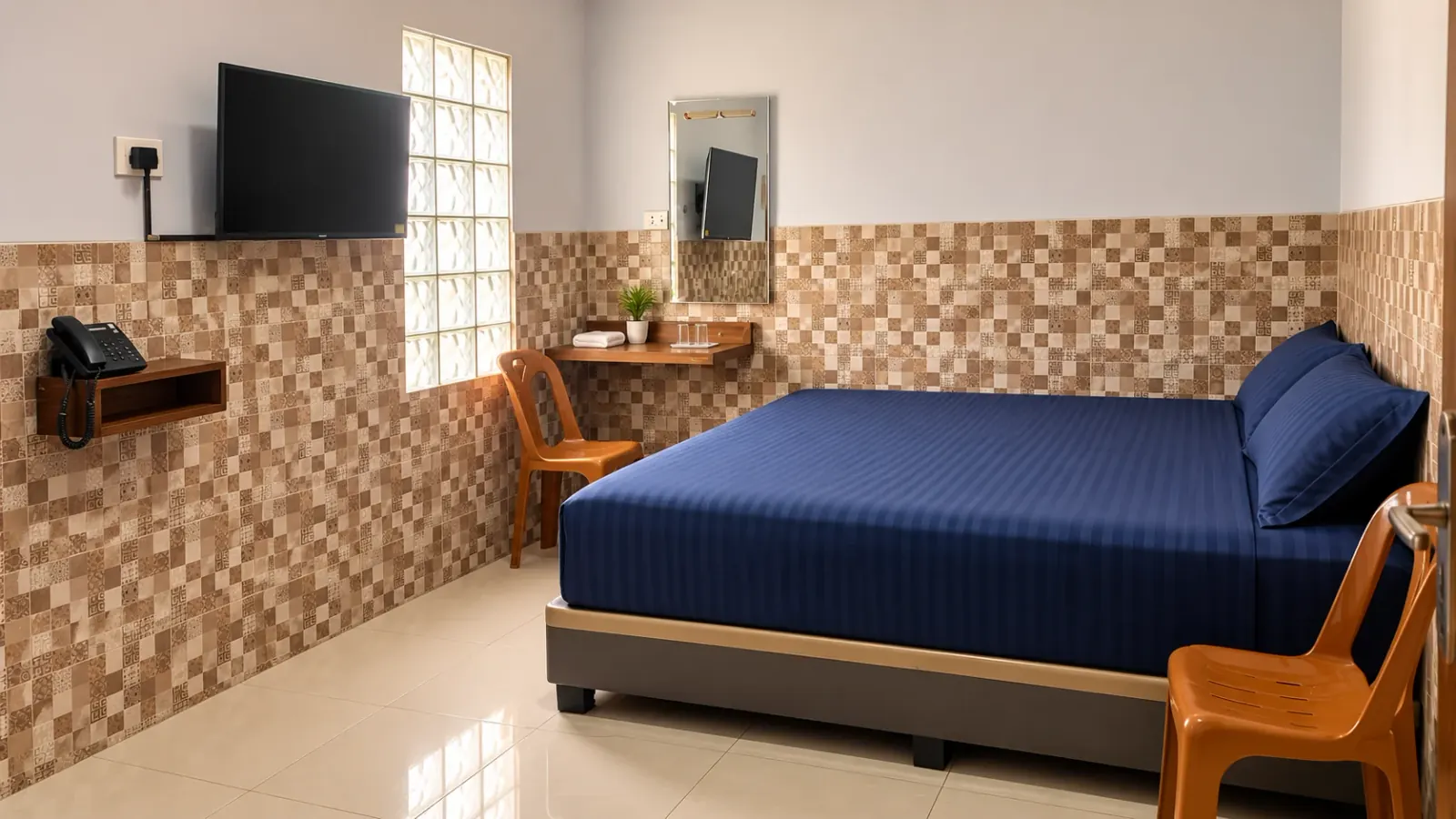 Kamar AC Penginapan Angkasa dengan Smart TV & kasur springbed queen